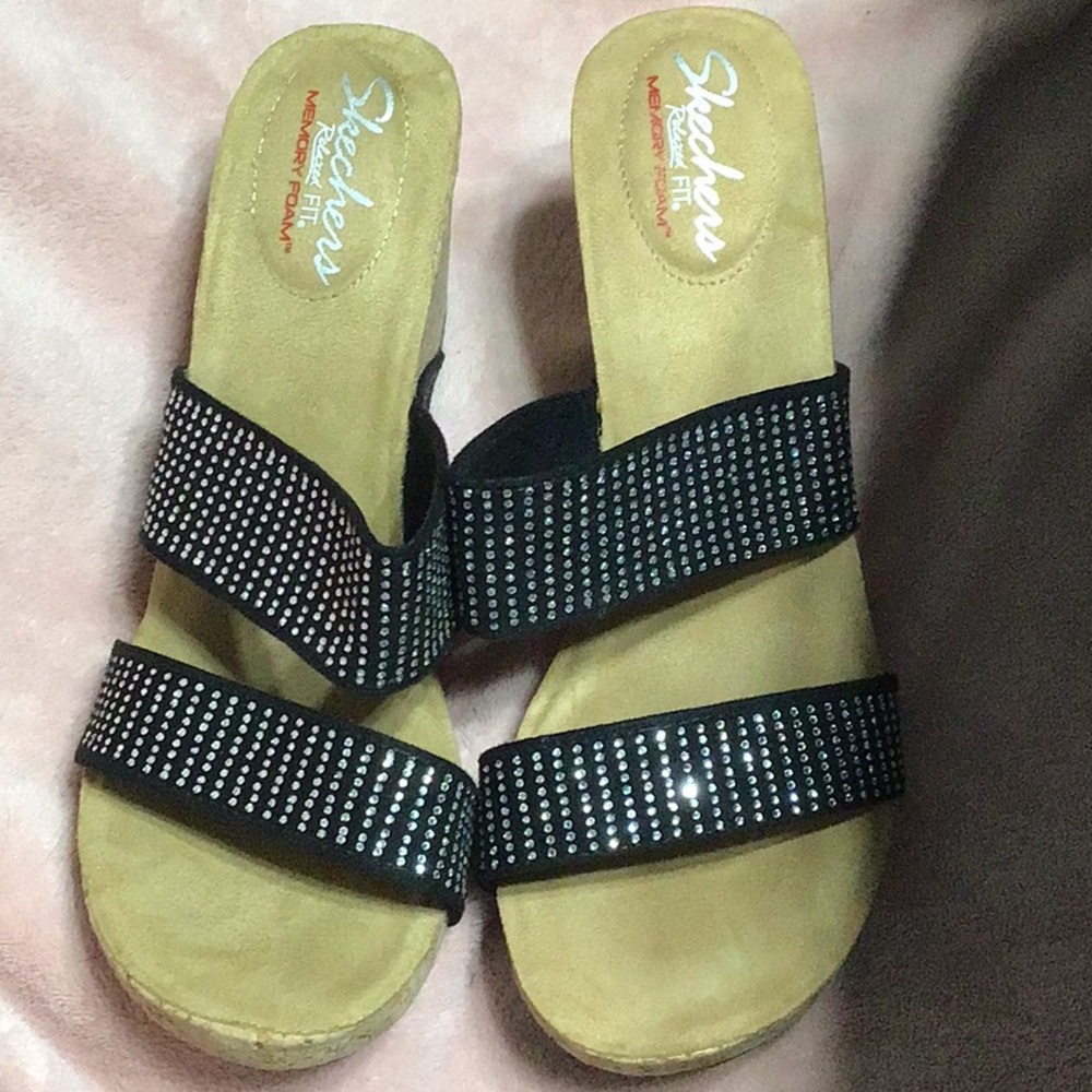 Skechers Black Wedge with Rhinestones is relaxed fit with memory foam heels.